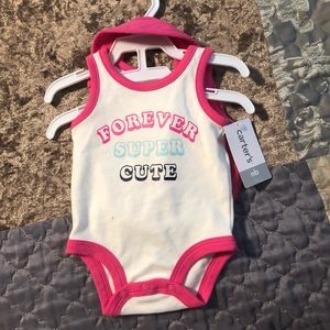 Two Newborn outfits